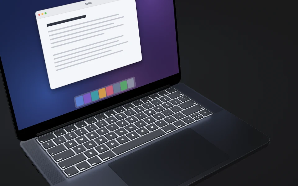 MacBook open to 100 degrees with its screen and keyboard bright